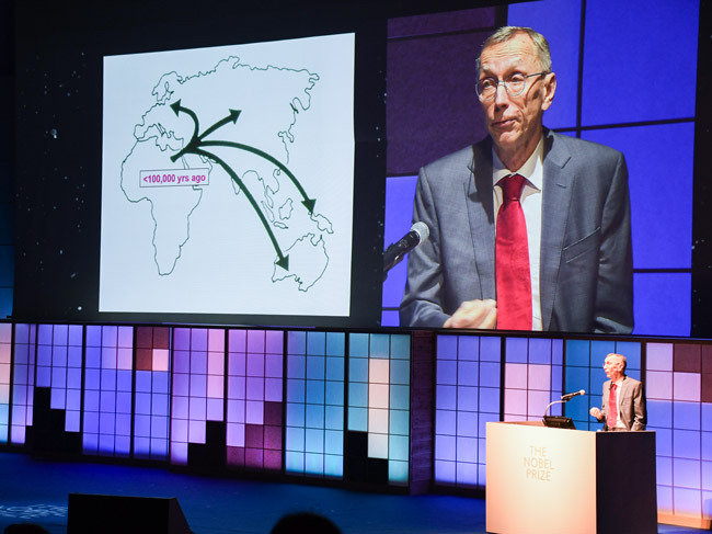 今の人の祖先はアフリカ大陸から広まったと語るペーボ氏(2025年3月、横浜市のパシフィコ横浜)